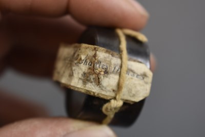 Lot 815 - A MUSKET BALL TAKEN FROM A WOUNDED OFFICER AT WATERLOO