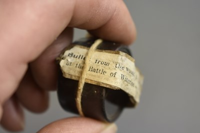 Lot 815 - A MUSKET BALL TAKEN FROM A WOUNDED OFFICER AT WATERLOO