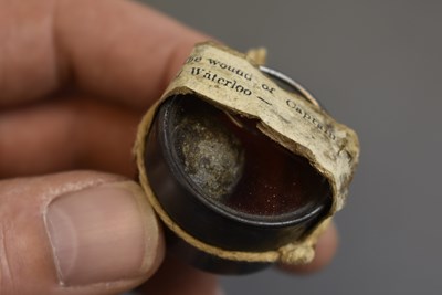 Lot 815 - A MUSKET BALL TAKEN FROM A WOUNDED OFFICER AT WATERLOO