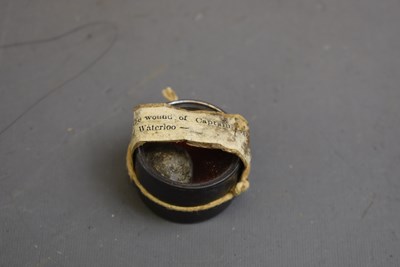 Lot 815 - A MUSKET BALL TAKEN FROM A WOUNDED OFFICER AT WATERLOO