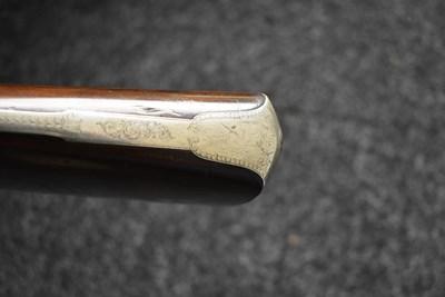 Lot 589 - A 14-BORE DOUBLE BARRELLED PERCUSSION SILVER MOUNTED SPORTING GUN BY JOHN MANTON & SON