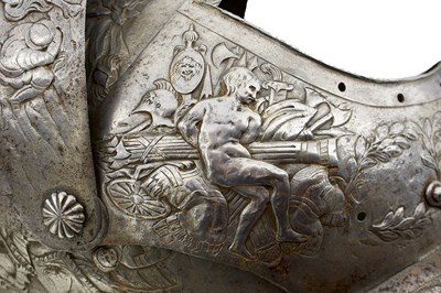 Lot 388 - AN EMBOSSED CLOSE HELMET IN THE EARLY 17TH CENTURY MANNER