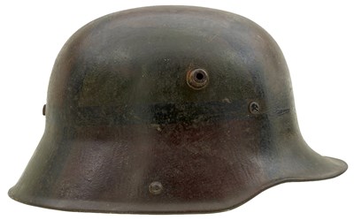 Lot 739 - AN IMPERIAL GERMAN M1916 CAMOUFLAGED HELMET