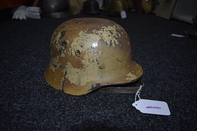 Lot 736 - A THIRD REICH M1940 GERMAN HELMET