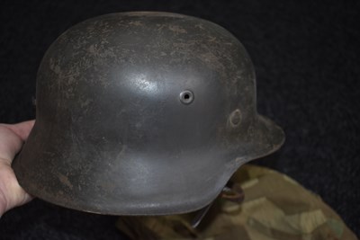 Lot 740 - A THIRD REICH M1942 GERMAN HELMET