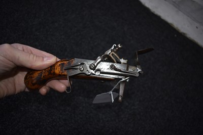 Lot 605 - AN EARLY 18TH CENTURY FLINTLOCK TINDER LIGHTER