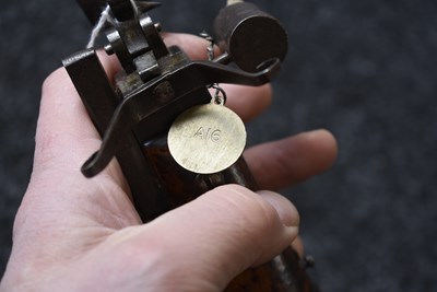 Lot 605 - AN EARLY 18TH CENTURY FLINTLOCK TINDER LIGHTER