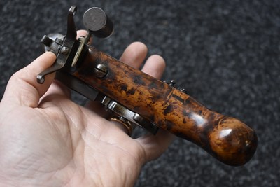 Lot 605 - AN EARLY 18TH CENTURY FLINTLOCK TINDER LIGHTER