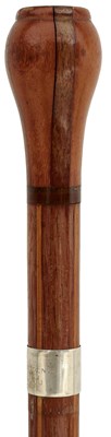 Lot 931 - A MID 20TH CENTURY FIJIAN HARDWOOD WALKING STICK