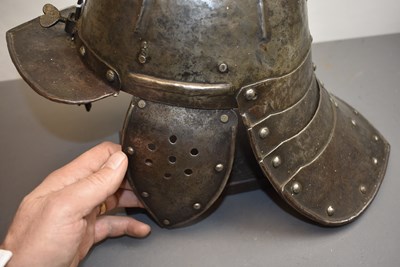 Lot 863 - A MID-17TH CENTURY ENGLISH CIVIL WAR PERIOD LOBSTER TAILED POT OR HELMET