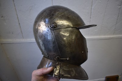 Lot 390 - A 17TH CENTURY ENGLISH CLOSE HELMET OF TOTENKOPF OR SAVOYARD FORM