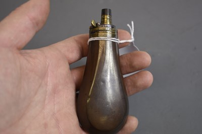 Lot 440 - A PISTOL SIZED POWDER FLASK