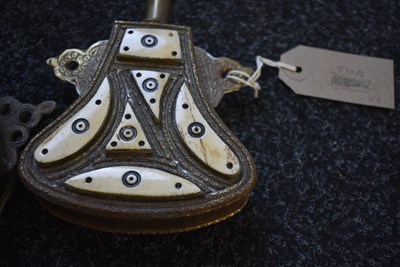 Lot 527 - A CONTINENTAL SEED FORM CIRCULAR WOODEN POWDER FLASK