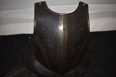 Lot 396 - A LATE 16TH CENTURY GERMAN BLACK AND WHITE BREAST PLATE AND TASSET ENSEMBLE