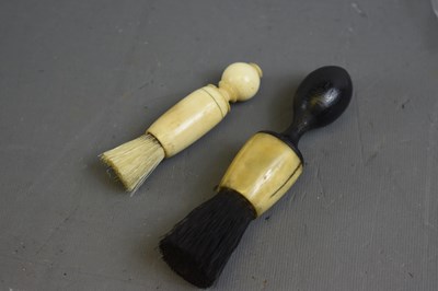 Lot 467 - TWO FLINTLOCK PAN BRUSHES