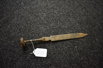 Lot 830 - AN IRON AGE SWORD IN EXCAVATED CONDITION