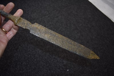 Lot 830 - AN IRON AGE SWORD IN EXCAVATED CONDITION