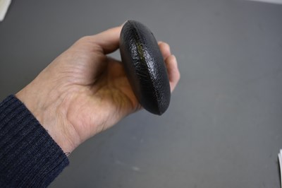 Lot 444 - A LEATHER COVERED GUN OR RIFLE FLASK