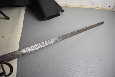 Lot AN 18TH CENTURY BASKET HILTED BACK SWORD