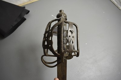 Lot 323 - AN 18TH CENTURY BASKET HILTED BACK SWORD