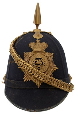 Lot 743 - AN OTHER RANK'S TATTOO BLUE CLOTH HELMET TO THE SOUTH WALES BORDERERS