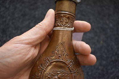 Lot 443 - A PHARAOH'S HORSES EMBOSSED POWDER FLASK