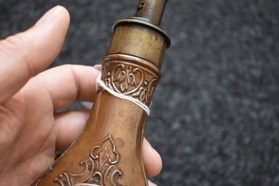 Lot 443 - A PHARAOH'S HORSES EMBOSSED POWDER FLASK