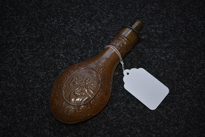 Lot 443 - A PHARAOH'S HORSES EMBOSSED POWDER FLASK