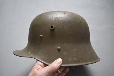 Lot 543 - AN AUSTRIAN WWI M1917 GERMAN PATTERN STEEL HELMET