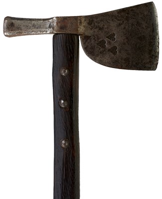 Lot 556 - AN AXE