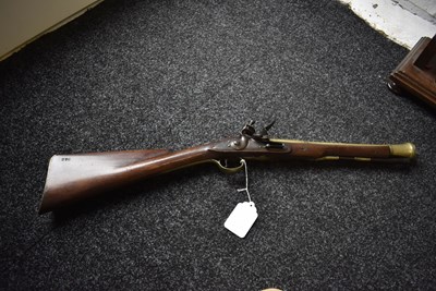 Lot 689 - A FLINTLOCK BLUNDERBUSS BY KETLAND & CO.