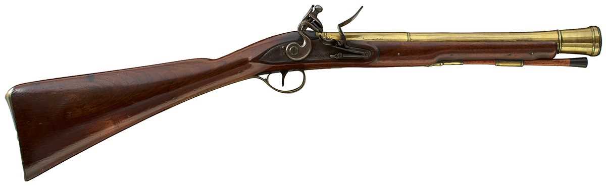 Lot 694 - A FLINTLOCK BRASS BARRELLED BLUNDERBUSS