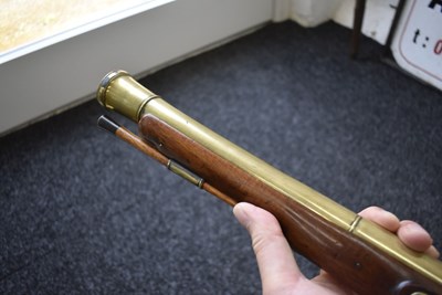 Lot 694 - A FLINTLOCK BRASS BARRELLED BLUNDERBUSS