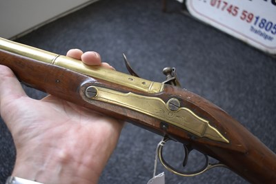 Lot 694 - A FLINTLOCK BRASS BARRELLED BLUNDERBUSS