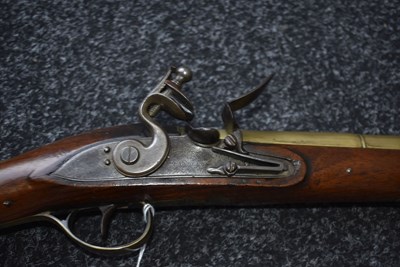 Lot 694 - A FLINTLOCK BRASS BARRELLED BLUNDERBUSS