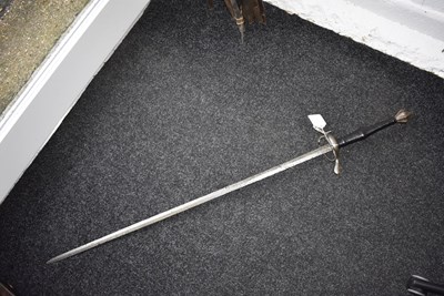 Lot AN EARLY 16TH CENTURY GERMAN BASTARD OR HAND AND A HALF SWORD