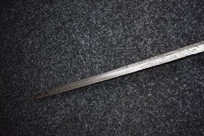 Lot AN EARLY 16TH CENTURY GERMAN BASTARD OR HAND AND A HALF SWORD