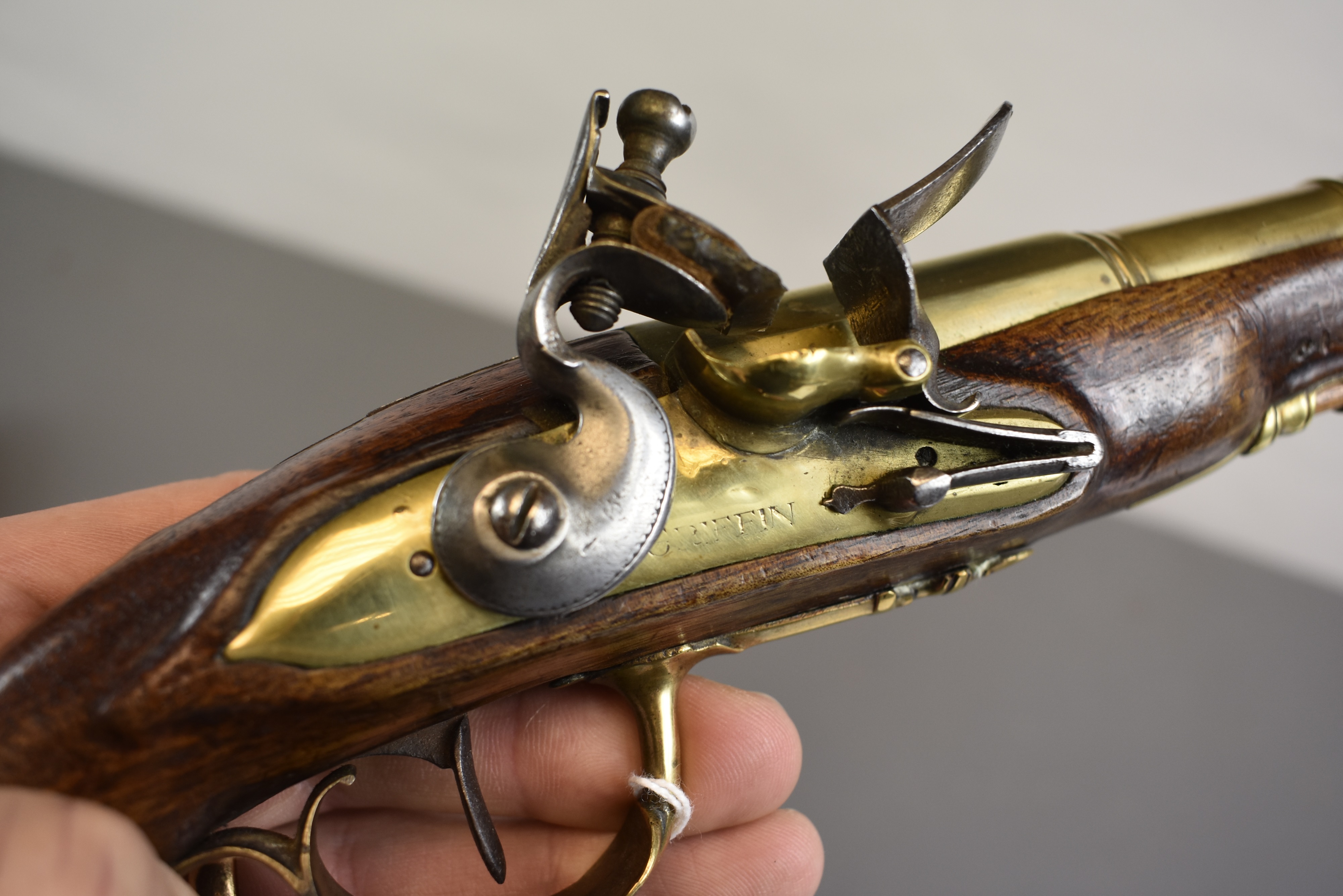 Lot 247 - A 25-BORE FLINTLOCK BRASS BARRELLED