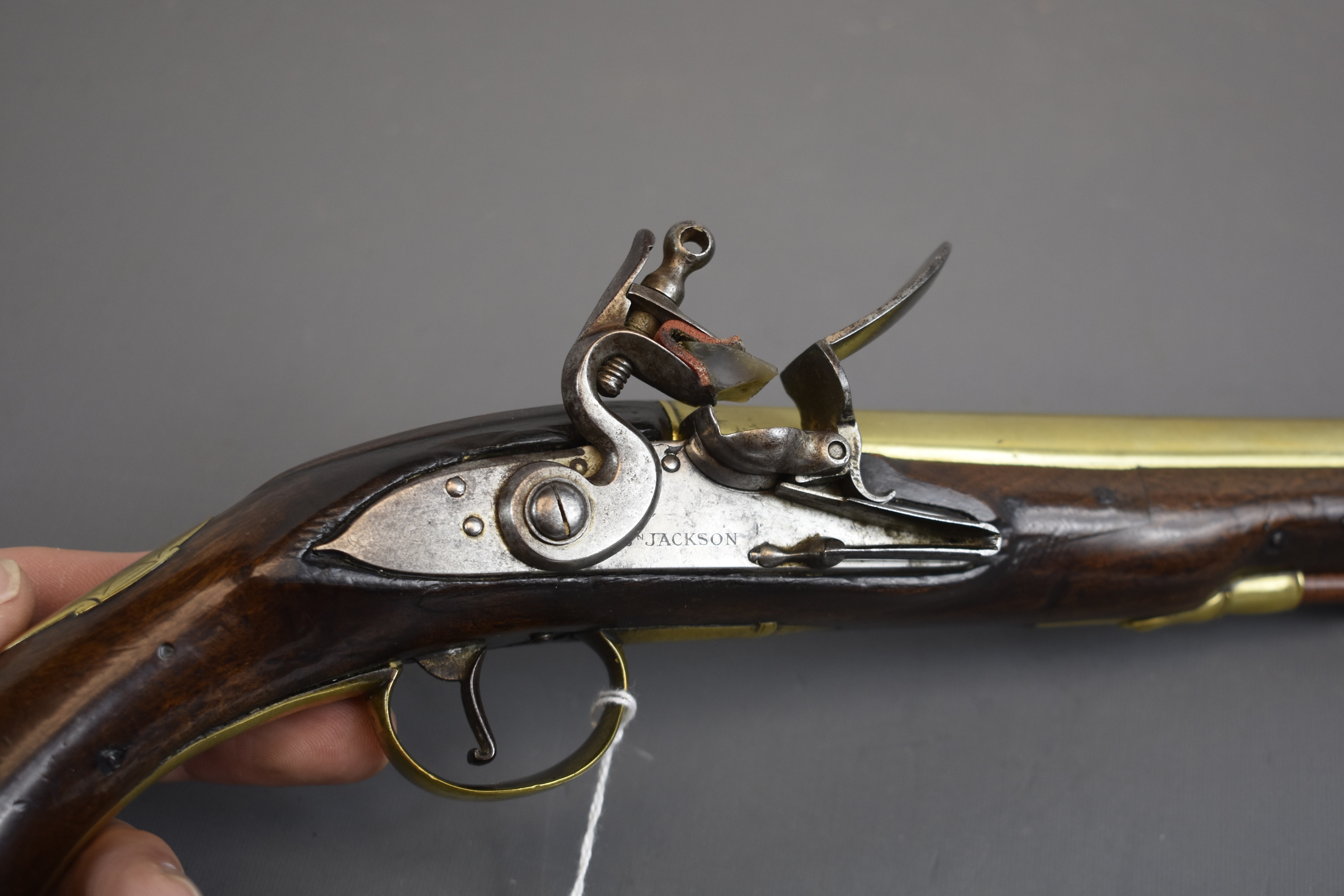 Lot 256 - AN 18-BORE FLINTLOCK BRASS BARRELLED