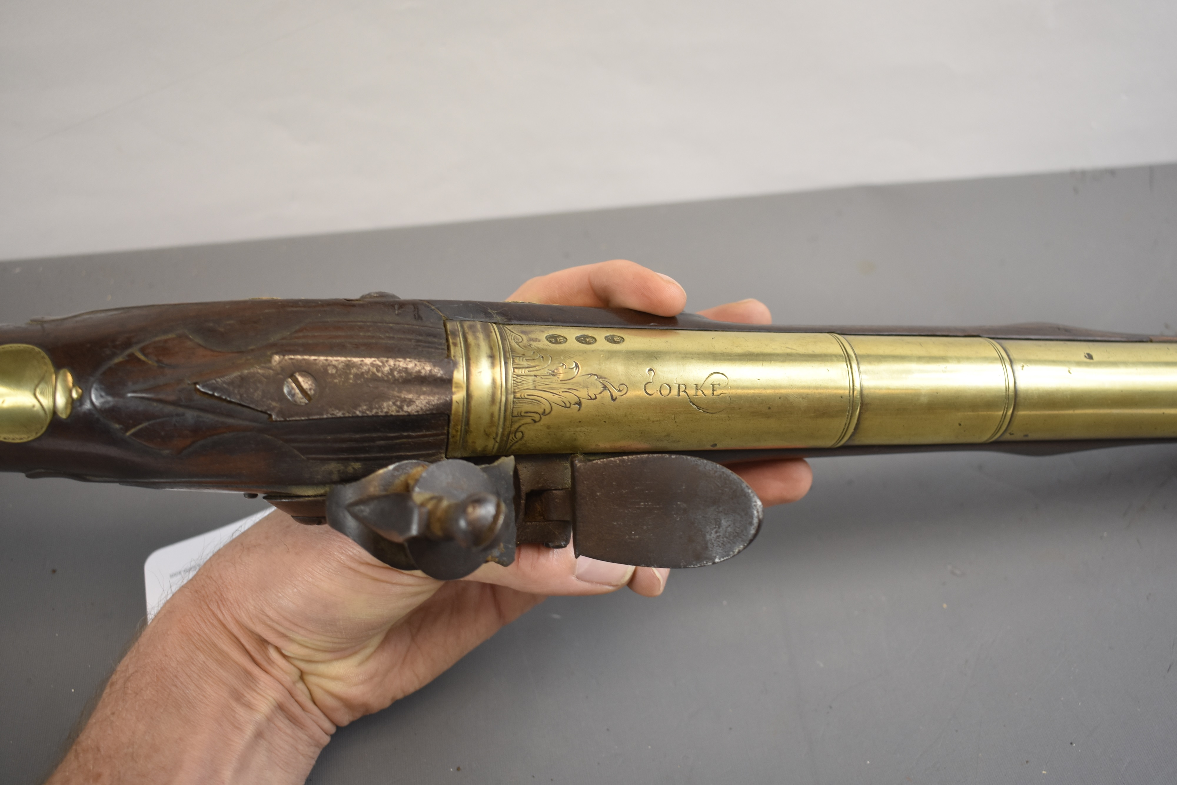 Lot 185 - A RARE 18TH CENTURY IRISH FLINTLOCK BRASS
