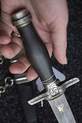 Lot 52 - A VERY RARE THIRD REICH POSTSCHUTZ PRESENTATION DAMASCUS BLADED DAGGER