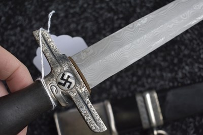 Lot 52 - A VERY RARE THIRD REICH POSTSCHUTZ PRESENTATION DAMASCUS BLADED DAGGER