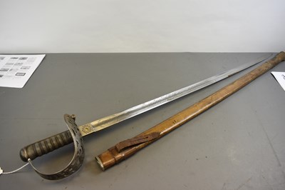 Lot 569 - A VICTORIAN HEAVY CAVALRY OFFICER'S SCROLL HILT SWORD