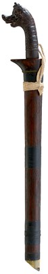 Lot 105 - A LATE 19TH CENTURY INDONESIAN BATU LAPAK PEDANG