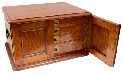 Lot AN OAK COLLECTOR'S CABINET