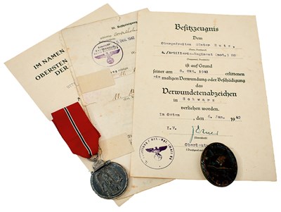Lot A SELECTION OF THIRD REICH AWARDS AND DOCUMENTS