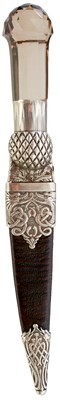 Lot AN EXHIBITION QUALITY SCOTTISH SILVER MOUNTED SGIAN DUBH