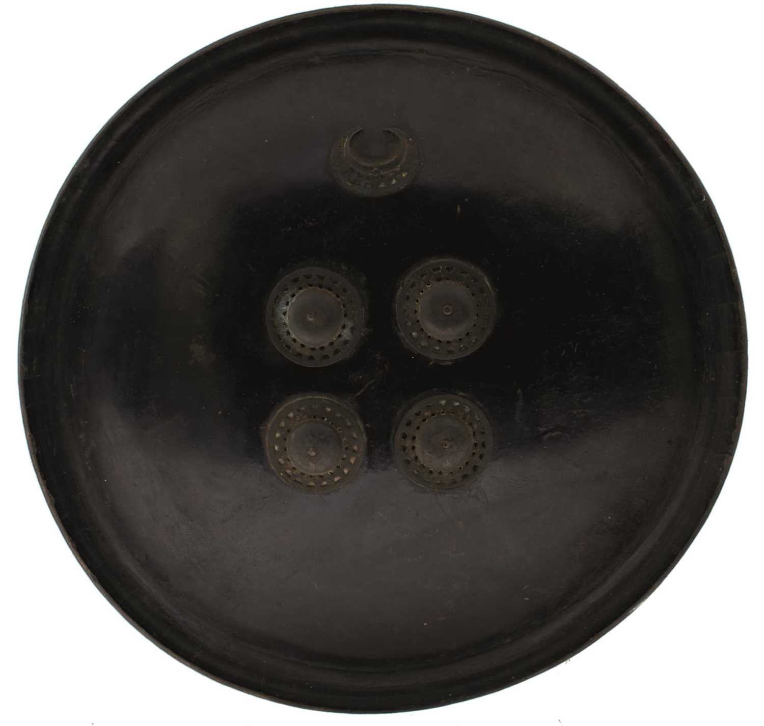 Lot 59 - OF TIPU SULTAN INTEREST - AN 18TH CENTURY INDIAN LACQUERED LEATHER SHIELD OR DHAL