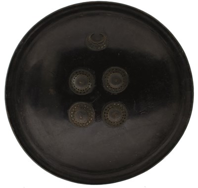 Lot 59 - OF TIPU SULTAN INTEREST - AN 18TH CENTURY INDIAN LACQUERED LEATHER SHIELD OR DHAL