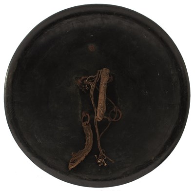 Lot 59 - OF TIPU SULTAN INTEREST - AN 18TH CENTURY INDIAN LACQUERED LEATHER SHIELD OR DHAL